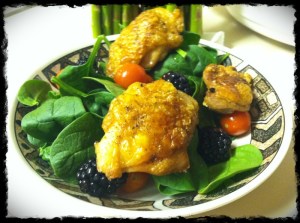 Dinner 1/22/13 – Chicken thighs on a bed of spinach, grape tomatoes and blackberries.