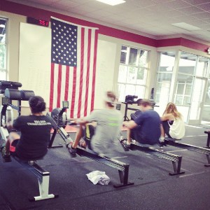 I'm rowing my butt off! Far left in gray shirt.